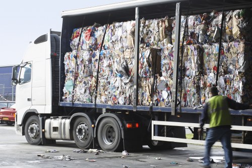 Expert office clearance team handling equipment